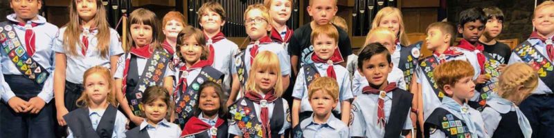 group of children posing for the Adventurer Club group photo