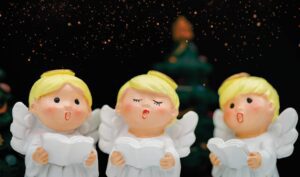 christmas caroling dolls
