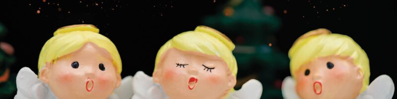 christmas caroling dolls